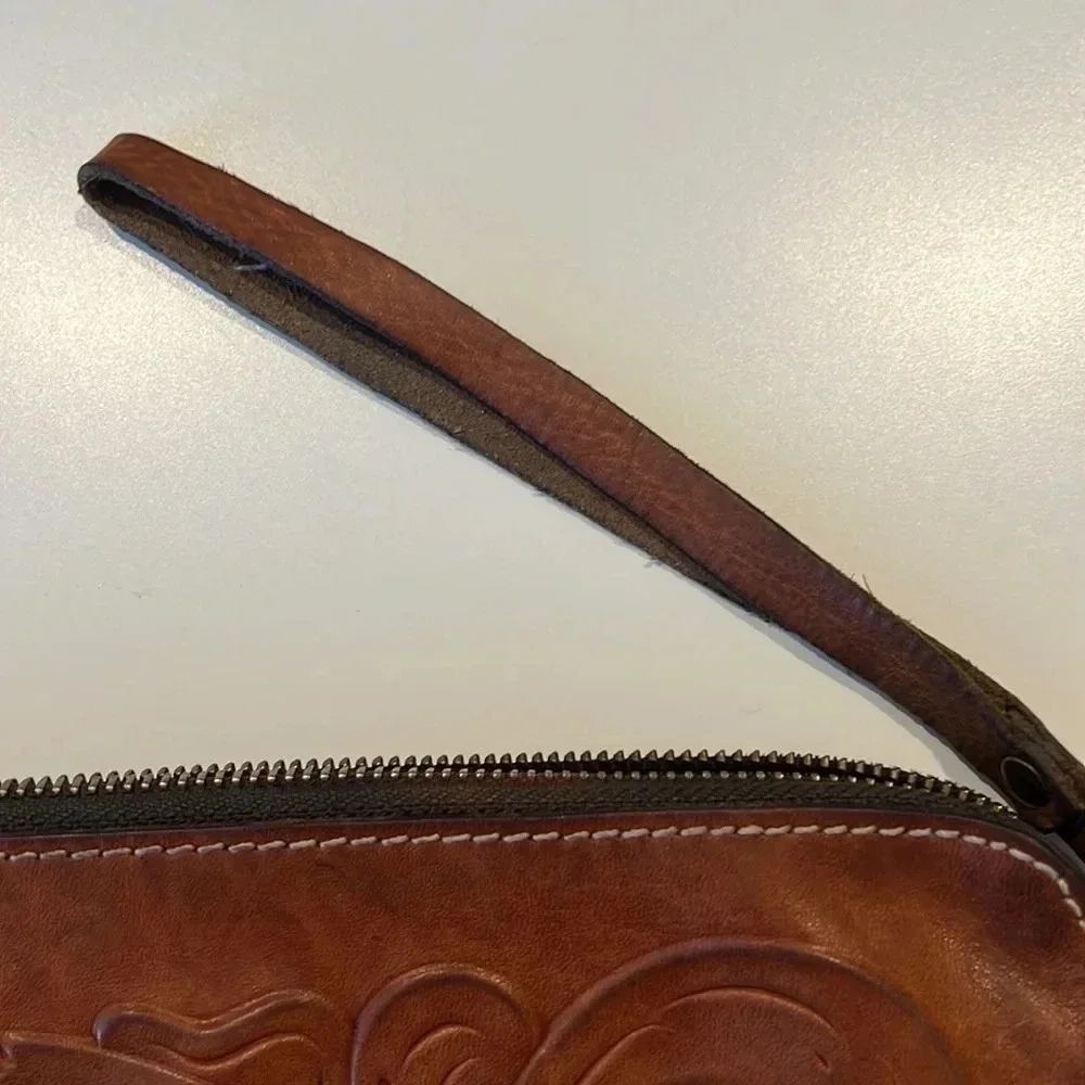 Patricia Nash Cassini Wristlet with tooled floral pattern in Florence Brown